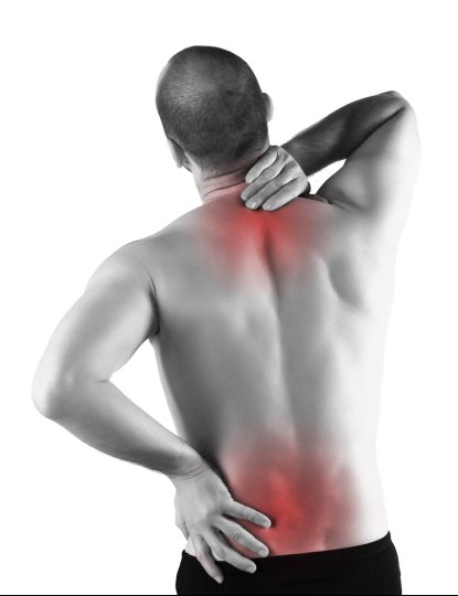 A man experiencing back pain in the neck and lower spine area.
