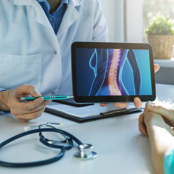 doctor explaining back pain options