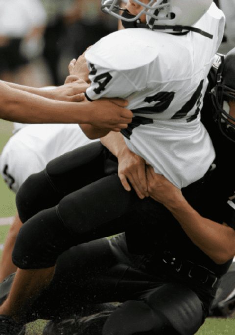 Tackle while playing football