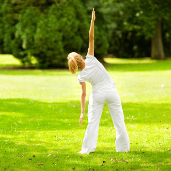 A Women Performing Side Stretch for Spine Mobility